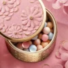 Light-Revealing Pearls of Powder